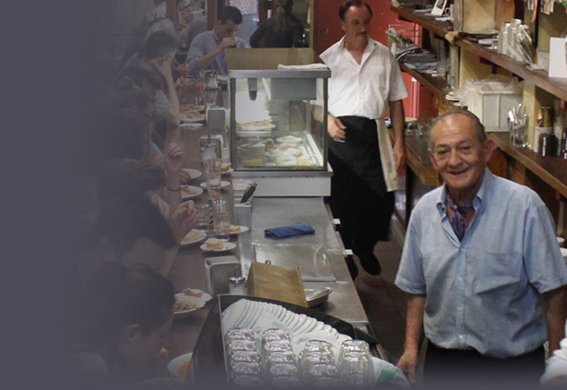 Sisto Malastina behind the famous Pellegrinis counter